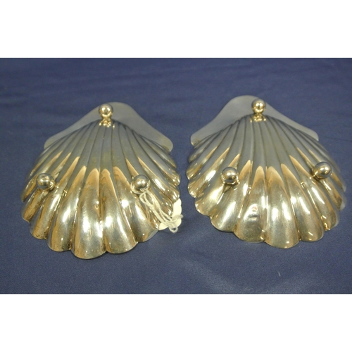 137 - Pair of Birmingham silver shell shaped bon-bon dishes, initialled and on ball feet.