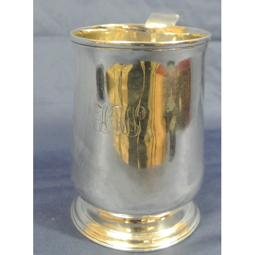 138 - George III Newcastle silver tankard of baluster form with wire rim, scroll handle and round stepped ... 