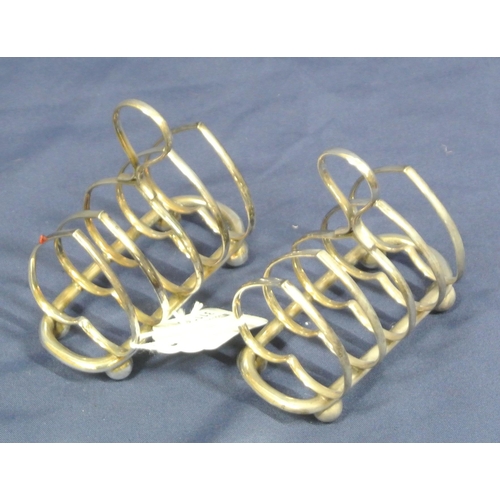 24 - Pair of small silver heart shaped plated toast racks with shaped handles