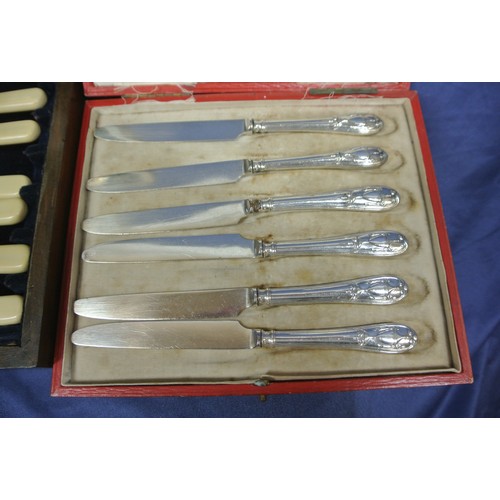 29 - Three sets of fruit cutlery, knives, in presentation cases