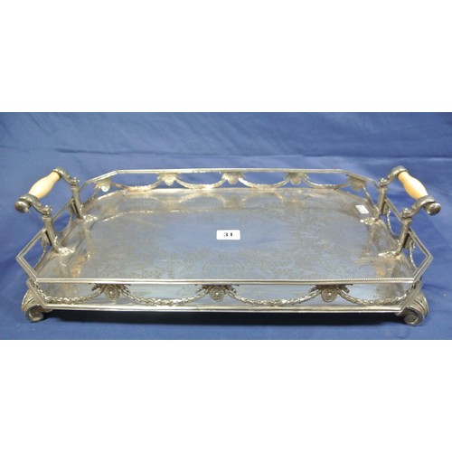 31 - Large silver plated serving tray with ribbon and filiate decoration, shaped handles