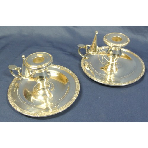 229 - Pair of Irish Provincial Silver chamber candlesticks with decorated rims, vase shaped sconces, handl... 