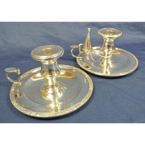 229 - Pair of Irish Provincial Silver chamber candlesticks with decorated rims, vase shaped sconces, handl... 