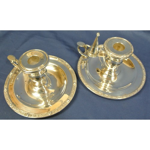 229 - Pair of Irish Provincial Silver chamber candlesticks with decorated rims, vase shaped sconces, handl... 