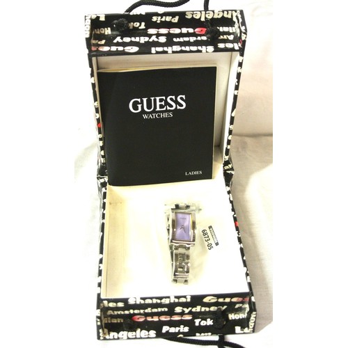 161 - Guess Ladies watch with iridescent plain face, in box