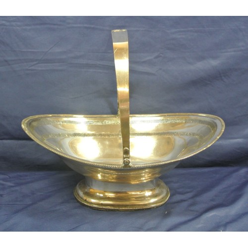 28 - Oval silver plated pierced oval bread basket with swing handle, gadroon rim and raised base