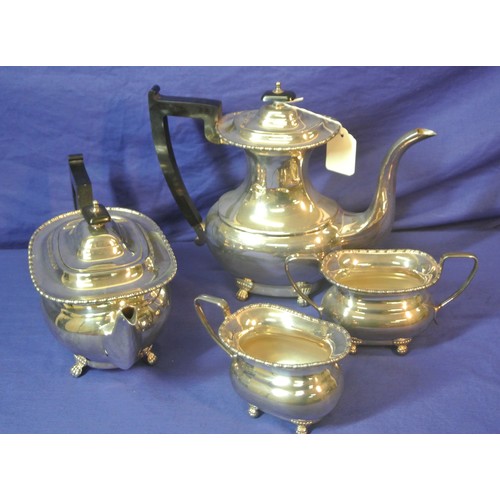 153 - 4 piece silverplated tea service with gadroon rims and cast feet