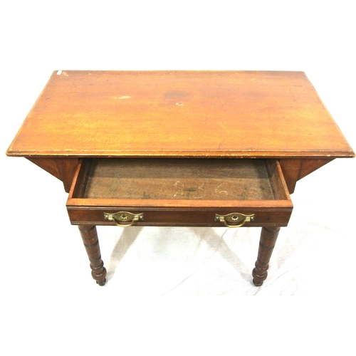110 - Edwardian style mahogany hall or side table with frieze drawer, drop handles, on turned tapering leg... 