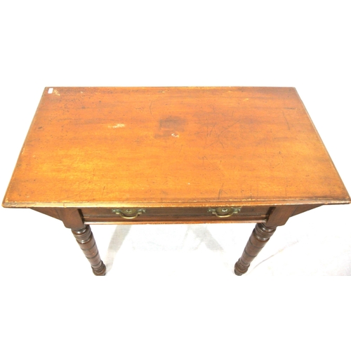 110 - Edwardian style mahogany hall or side table with frieze drawer, drop handles, on turned tapering leg... 