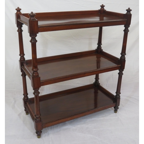 125 - Victorian mahogany 3-tier dumbwaiter with turned columns and finials, on turned legs