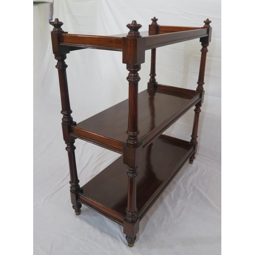 125 - Victorian mahogany 3-tier dumbwaiter with turned columns and finials, on turned legs