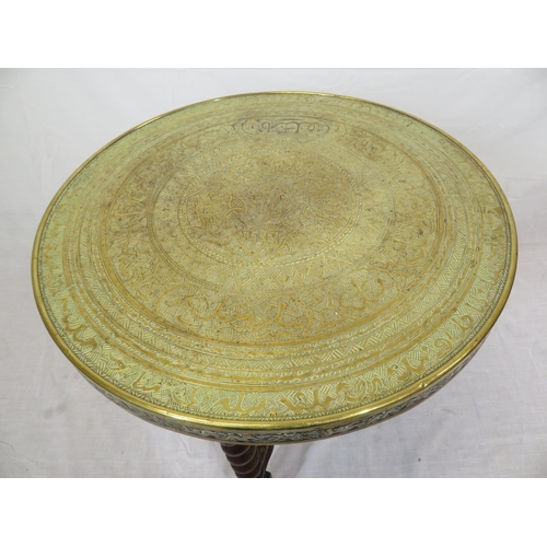 129 - Indian Benares brass occasional table with folding base