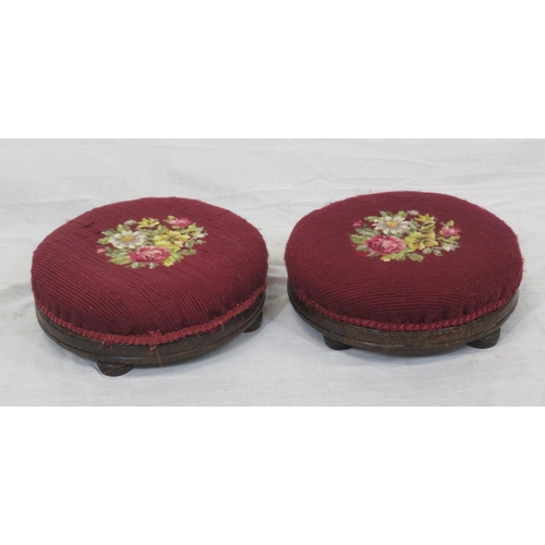 133 - Pair of Georgian style round footstools with foliate upholstery