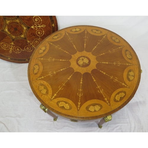 135 - Edwardian style inlaid and crossbanded round occasional or centre table with figured mounts, taperin... 