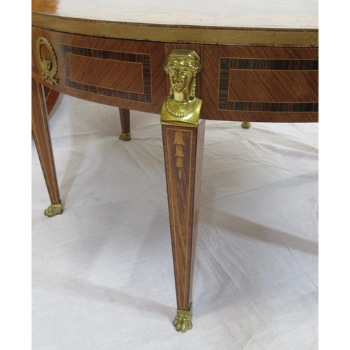 135 - Edwardian style inlaid and crossbanded round occasional or centre table with figured mounts, taperin... 