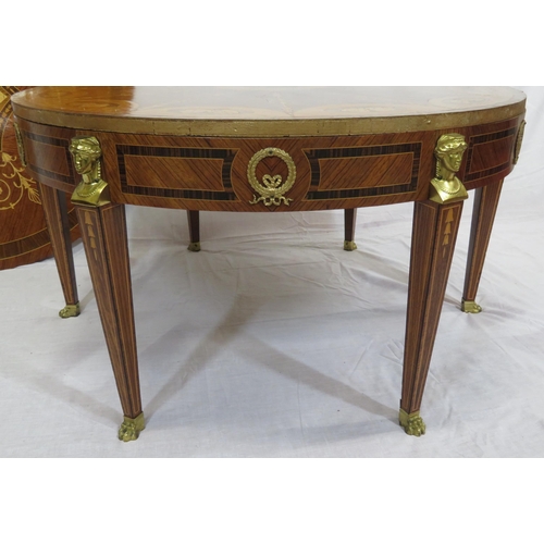 135 - Edwardian style inlaid and crossbanded round occasional or centre table with figured mounts, taperin... 