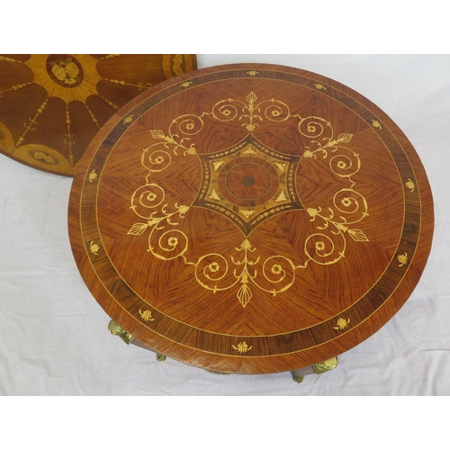 135 - Edwardian style inlaid and crossbanded round occasional or centre table with figured mounts, taperin... 