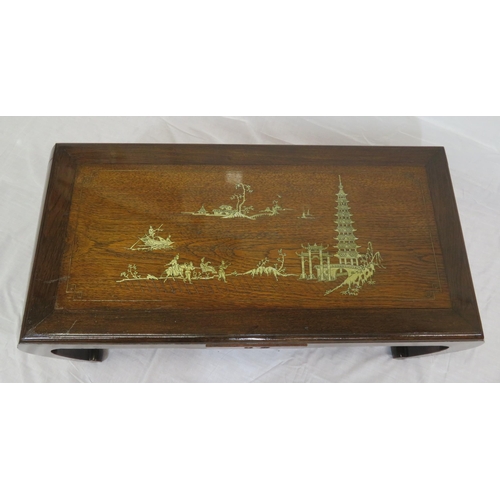 136 - Oriental oblong inlaid coffee table with ornate scenic figured inlay, on shaped legs