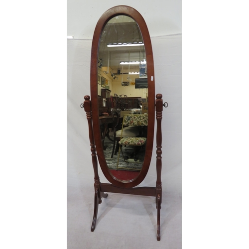 141 - Oval mahogany framed cheval mirror with turned columns and shaped legs