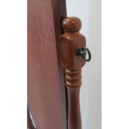 141 - Oval mahogany framed cheval mirror with turned columns and shaped legs