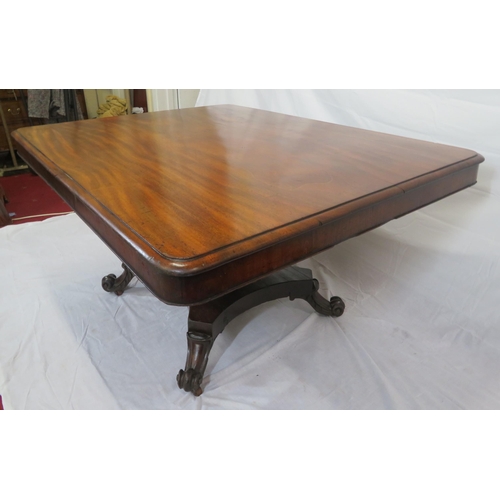 150 - Victorian mahogany dining or library table with tip-up top, hexagonal tapering column with round col... 