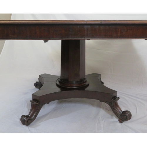 150 - Victorian mahogany dining or library table with tip-up top, hexagonal tapering column with round col... 