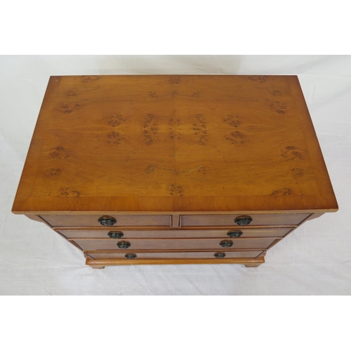 151 - Edwardian design crossbanded yew chest of 2 short and 3 long drawers with round drop handles, on bra... 