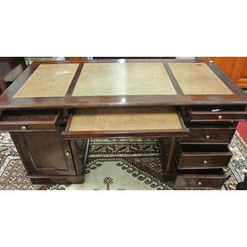 165 - Mahogany pedestal desk with leatherette insets, 2 frieze drawers, shelf, side drawers, on plinths