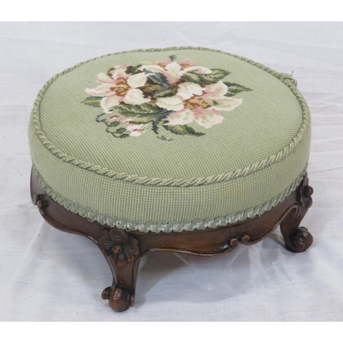 172 - 2 round Georgian style footstools with foliate upholstery and shaped legs