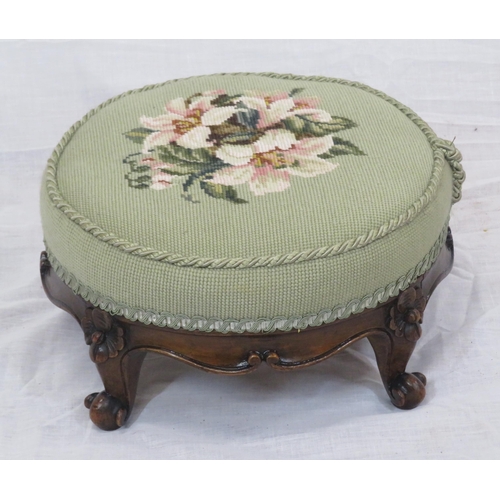 172 - 2 round Georgian style footstools with foliate upholstery and shaped legs