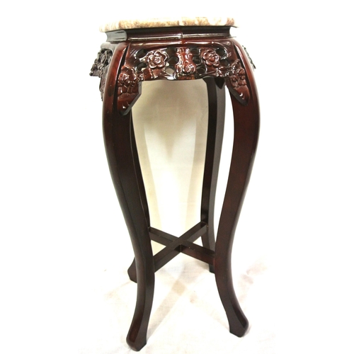 176 - Oriental style bust or plant stand with hexagonal marble top, foliate apron, on sabre legs