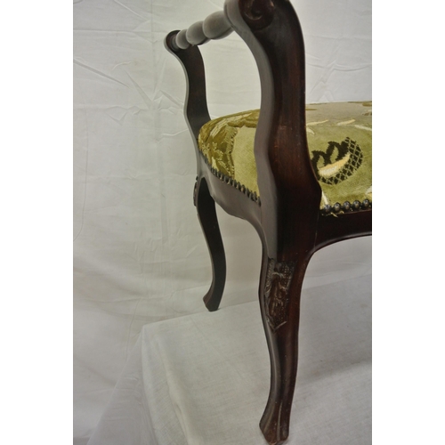 213 - Victorian mahogany dressing stool with floral upholstery, turned arms, on cabriole legs