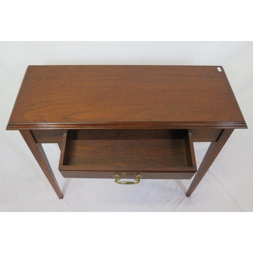 236 - Edwardian design mahogany hall or side table with frieze drawer, brass drop handle, on tapering legs