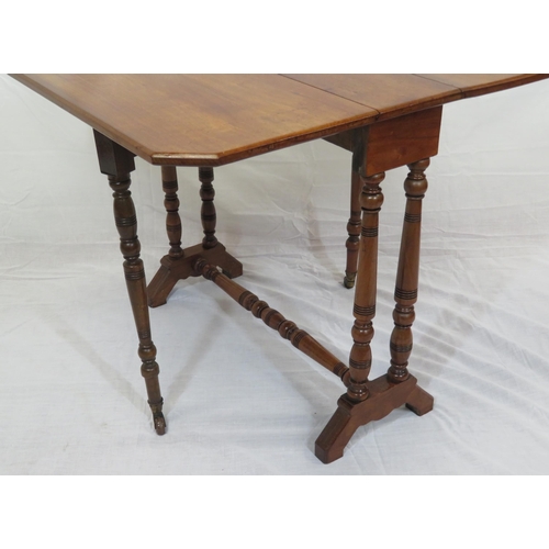 241 - Edwardian mahogany Sutherland table with drop leaves, angled corners, pull-out supports, turned colu... 