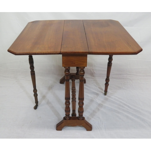 241 - Edwardian mahogany Sutherland table with drop leaves, angled corners, pull-out supports, turned colu... 