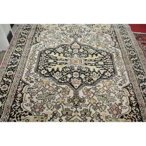 244 - Iranian cream ground rug with traditional floral pattern