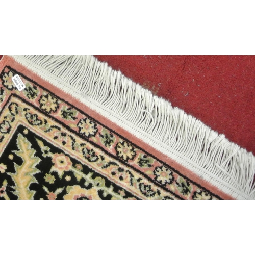 244 - Iranian cream ground rug with traditional floral pattern