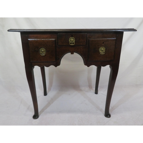 260 - Georgian oak lowboy with 3 drawers, brass drop handles with round backplates, on cabriole legs with ... 