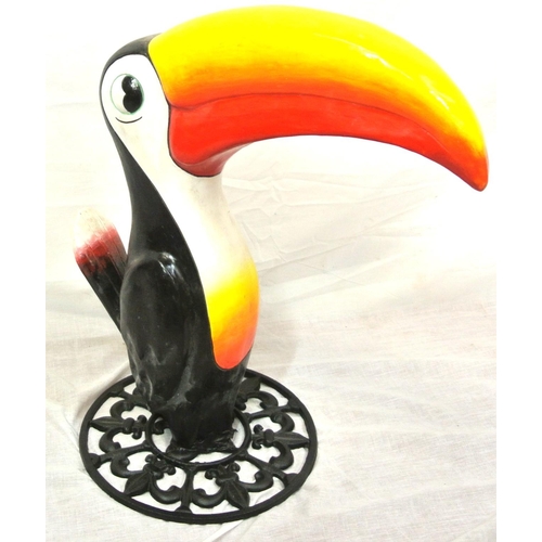 269 - Resin advertising figure of a Toucan, on round cast iron base