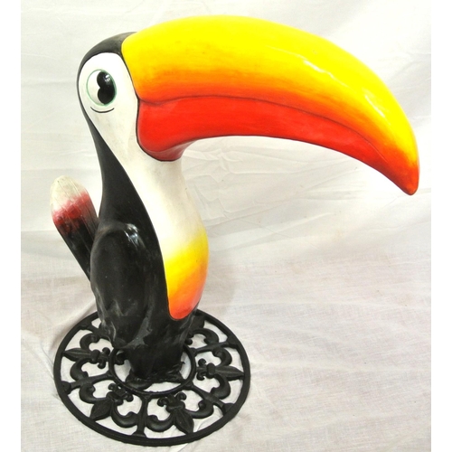 269 - Resin advertising figure of a Toucan, on round cast iron base