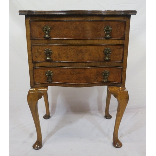 276 - Edwardian walnut serpentine fronted chest of 3 drawers with ornate brass drop handles, on cabriole l... 