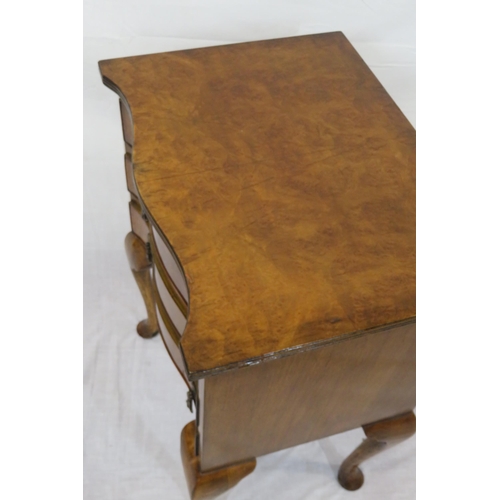 276 - Edwardian walnut serpentine fronted chest of 3 drawers with ornate brass drop handles, on cabriole l... 