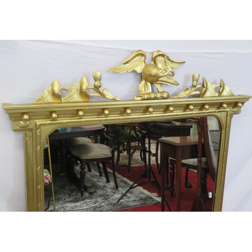 281 - Regency style gilt framed overmantle with eagle pediment and ball decoration