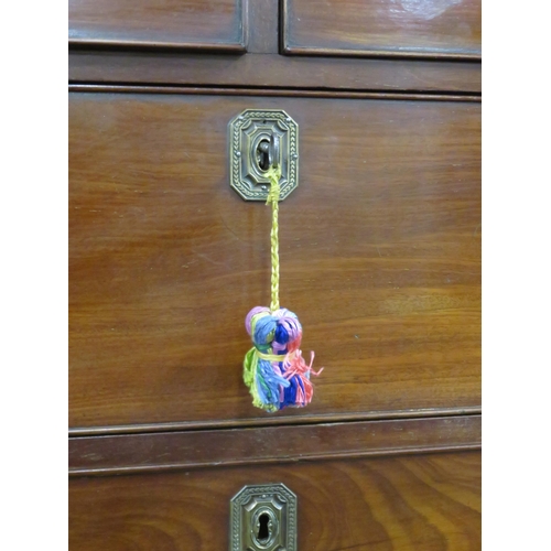 290 - Edwardian mahogany cabinet on chest with oval reeded brass drop handles and escutcheons, on bracket ... 