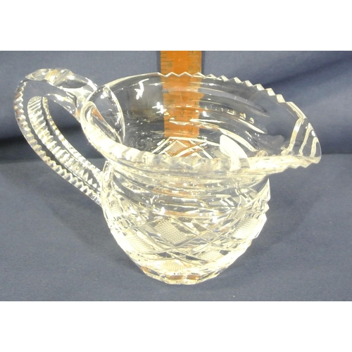 293 - Waterford Crystal cut glass cream jug with serrated rim and strawberry diamond panel