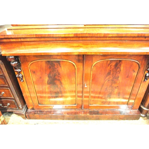 305 - Victorian mahogany bookcase with glazed doors, shelving, drawer, press under, on plinth