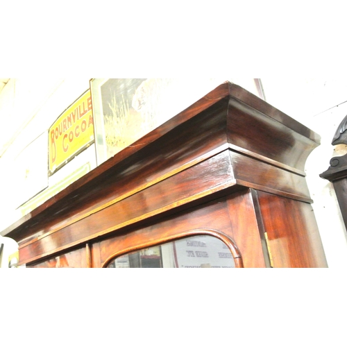 305 - Victorian mahogany bookcase with glazed doors, shelving, drawer, press under, on plinth