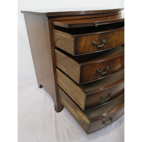 324 - Edwardian mahogany bowfront bachelors chest with shelf, 4 drawers under with drop handles, on bracke... 