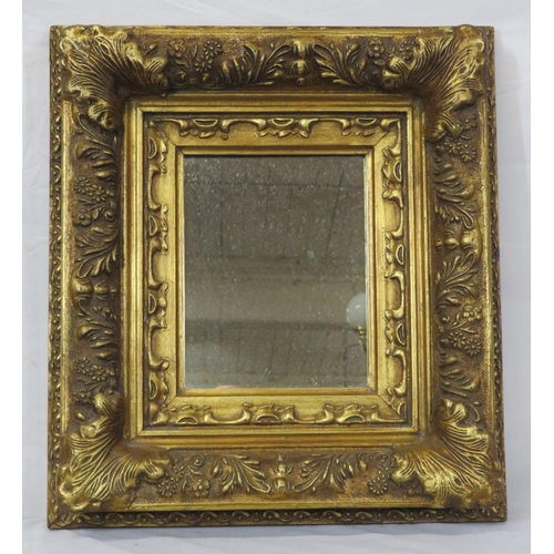 328 - Regency style gilt framed wall mirror with ornate floral and shell decoration