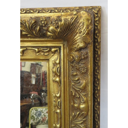 328 - Regency style gilt framed wall mirror with ornate floral and shell decoration